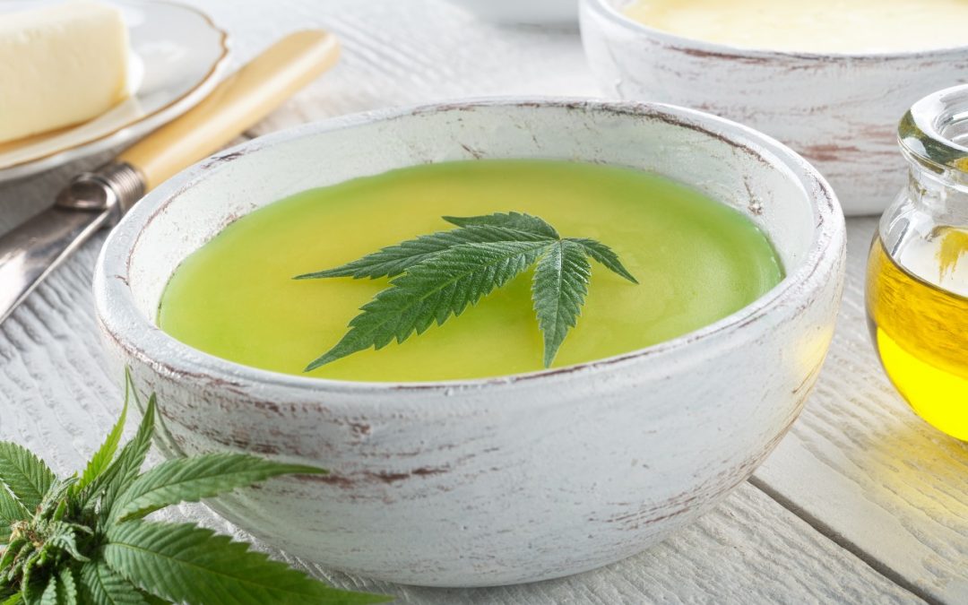 Marijuana leaf floating in Cannabis infused oil